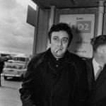 American comedian Lenny Bruce (1926 - 1966) at London Airport. (Photo by Dove/Getty Images)